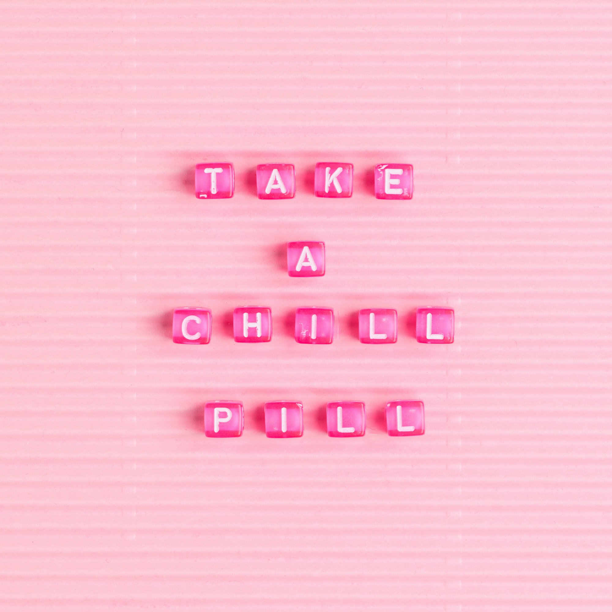 TAKE A CHILL PILL beads text typography